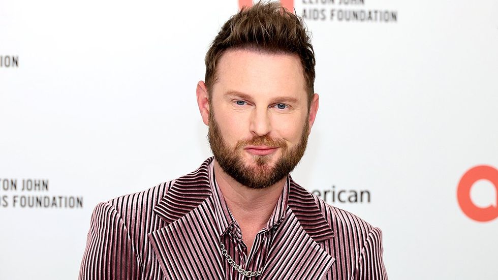 Bobby Berk smirk elton john aids foundation red carpet