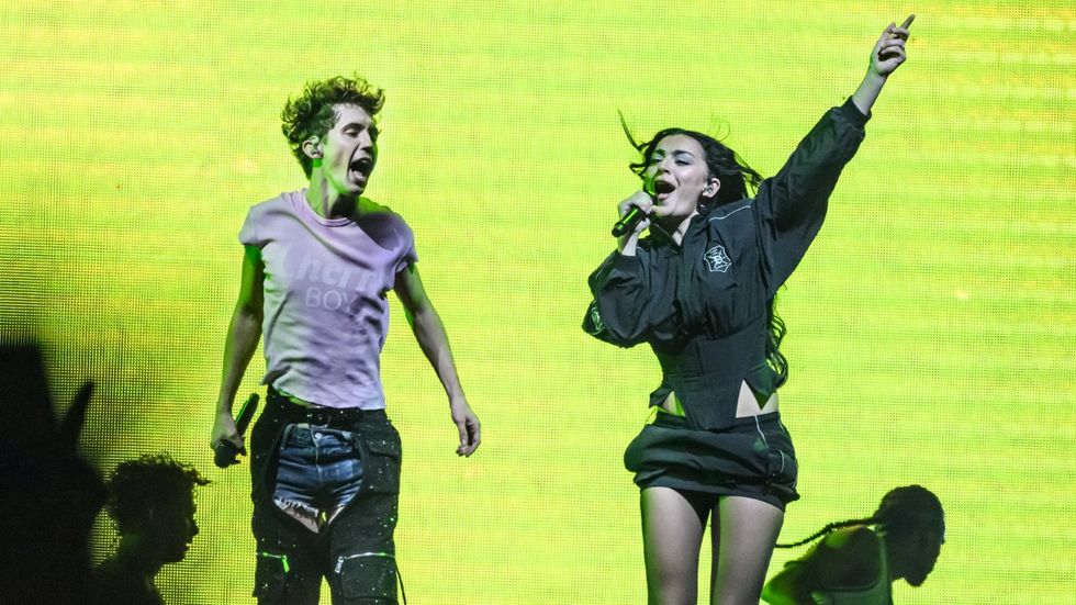 Charli XCX joins Troye Sivan on stage during the Something to Give Each Other Tour at OVO Arena Wembley on June 27, 2024 in London, England.