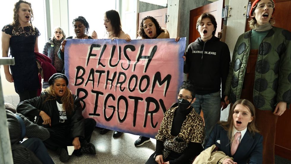 Chelsea Manning and Raquel Willis among 15 arrested at U.S. Capitol during bathroom sit-in