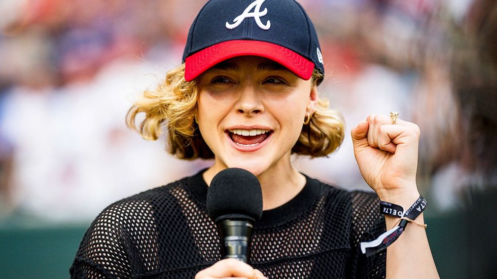 Chloë Grace Moretz left hand engagement ring gives the play ball announcement Atlanta Braves MLB baseball game