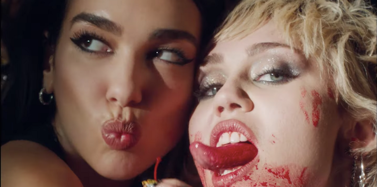 1200px x 598px - Miley Cyrus and Dua Lipa Team Up for Steamy, Trashy 'Prisoner' Video