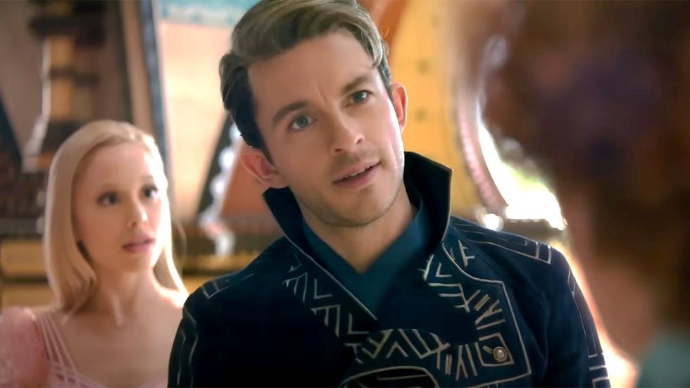 gay actor Jonathan Bailey as Fiyero in Wicked movie ariana grande in background