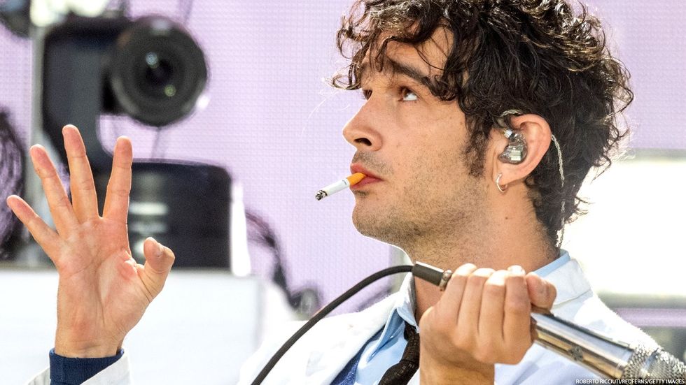 The 1975 Lead Singer Matty Healy Makes Out With Male Fan on Stage