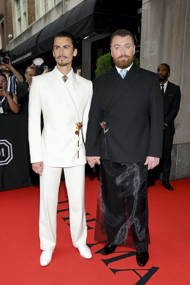 Sam Smith & Christian Cowan wore matching suits & held hands at the 2024  Met Gala