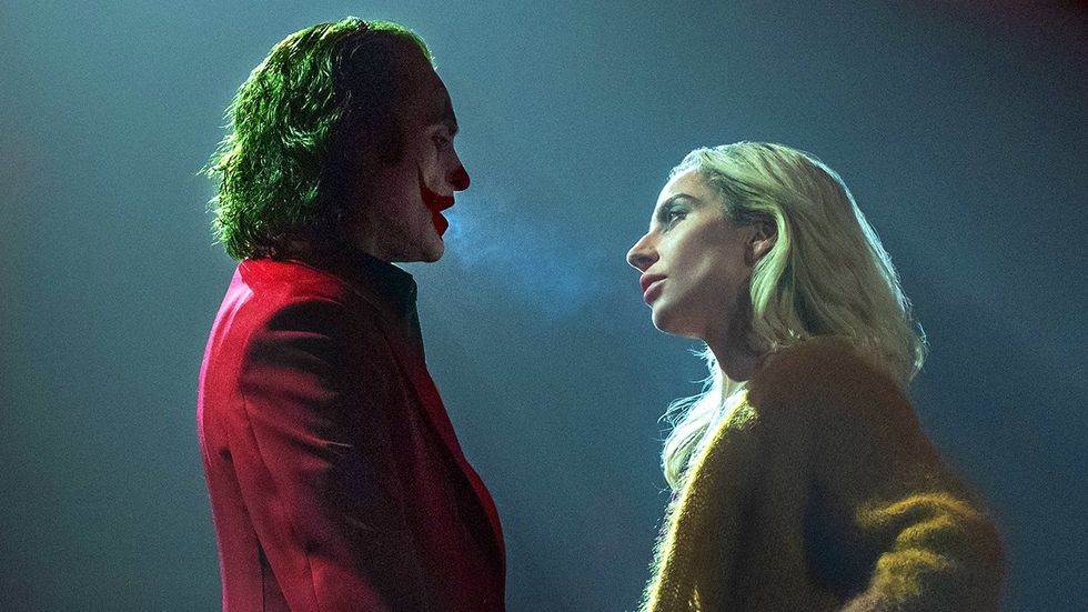 JOAQUIN PHOENIX as Arthur Fleck Joker and LADY GAGA as Lee Quinzel in Warner Bros Pictures JOKER FOLIE A DEUX