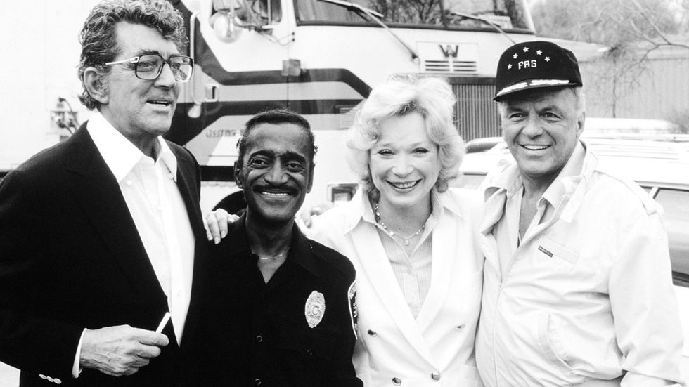 Rat Pack members Dean Martin Sammy Davis Jr Shirley MacLaine Frank Sinatra during the filming of the comedy Cannonball Run II