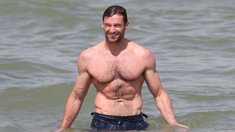 Shirtless Hugh Jackman at the beach.