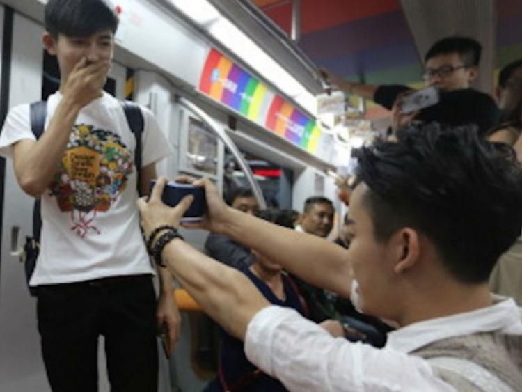 Watch Gay Couple Gets Engaged On Beijing Subway Crowd Cheers